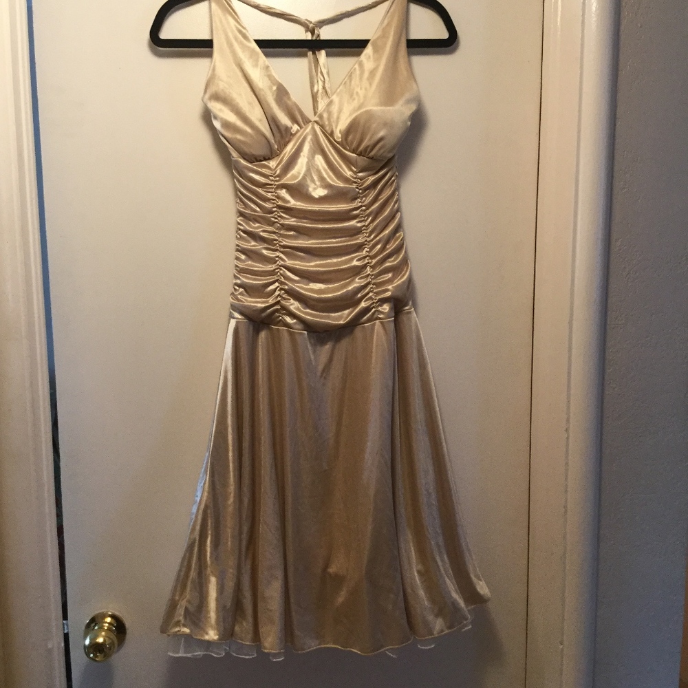 Gold backless  halter top dress